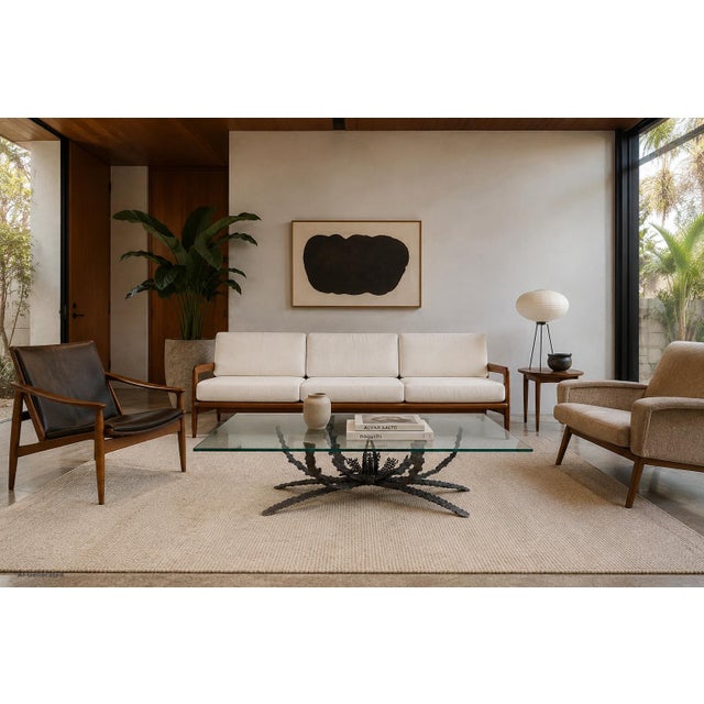 Mid-century modern sculptural bronze coffee table designed by American sculptor Daniel Gluck, USA, 1970s. Blurring the...