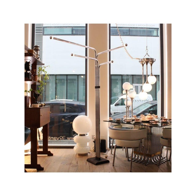 Type 4-light floor lamp Date 1970-1979 Style Mid-Century Model 4-light adjustable floor lamp Origin Italy Designer...