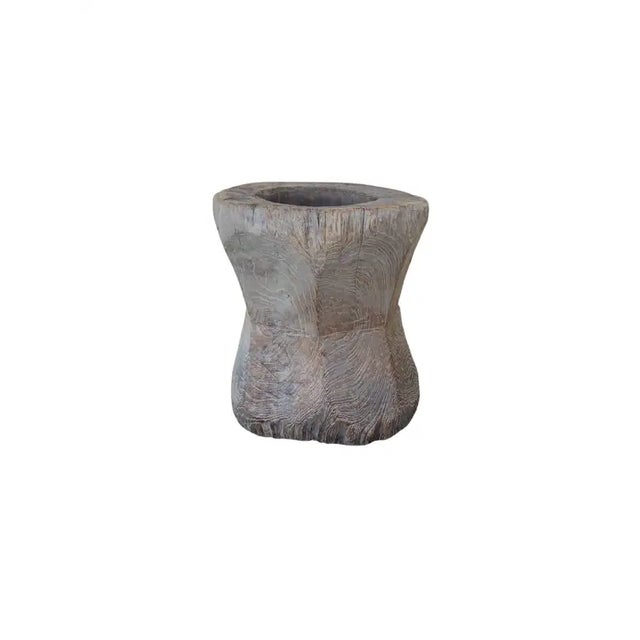 A vintage mortar bowl soured from rural Java & crafted from a solid teak wood slab. A raw and organic object with...