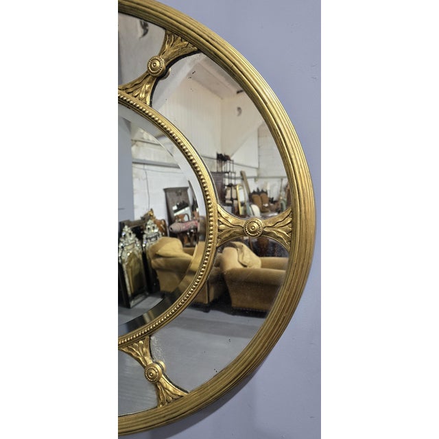 Outstanding and large water gilded English oval Chippendale style marginal mirror, some slight foxing to parts of the...