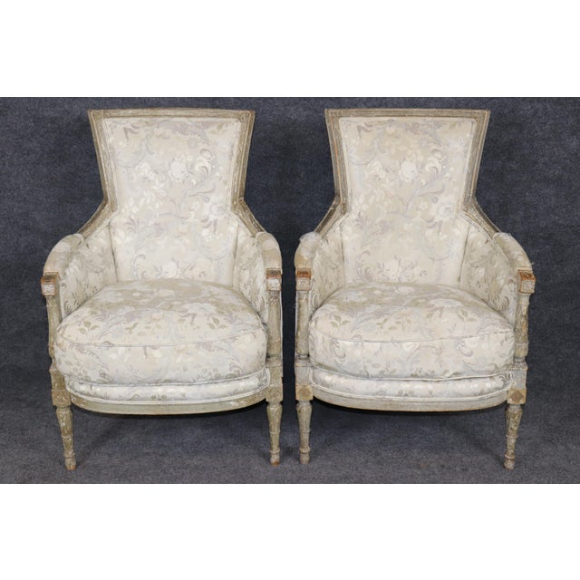 Representing the refined transition from the ornate grandeur of the Louis XVI period to the restrained elegance of the...