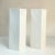 Pair of tall white porcelain square vases with vertical relief surface, by Hutschenreuther Germany, 1960s. This piece is...