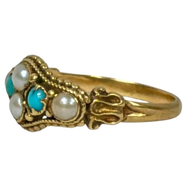 18K Gold Pearl and Turquoise Cocktail Ring. Ring features a decorative arrangement of four white pearls and two vivid...