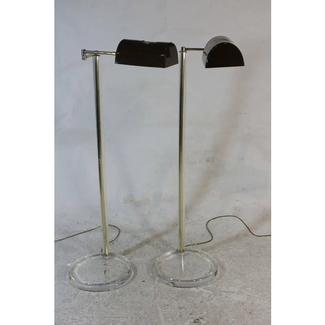 A pair of Luxe designer floor lamps, made to Impress! Very nicely designed Luxe quality lamps by Bauer in the manner of...