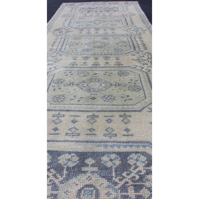 Textile Vintage Turkish Oushak Runner in Faded Blue in Neutral Background For Sale - Image 7 of 13