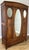 This elegant Antique French wardrobe combines practical storage with timeless period charm, featuring a warm oak finish,...