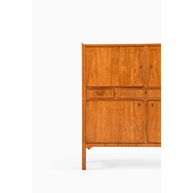 Rare cabinet designed by Axel Bäck. Produced by Eksjö Möbelfabrik in Sweden. This piece is attributed to the mentioned...