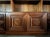 Vintage mid 20th century, three-section bookcase in beautiful French walnut. This impressive bookcase features lower...