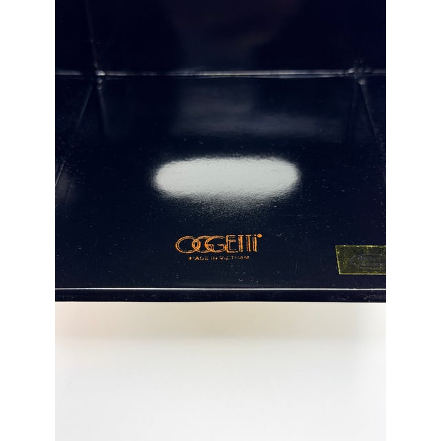 Elegant Oggetti tissue box cover finished in a silver surface with the brand’s signature handcrafted texture. Minimalist...