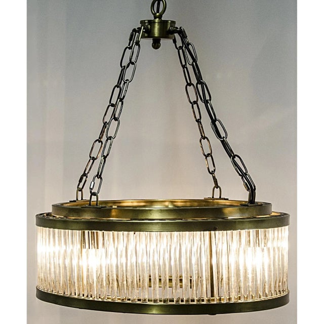 Art Deco inspired but still very, very contemporary, the handcrafted Petronas chandelier features cascading glass crystals...