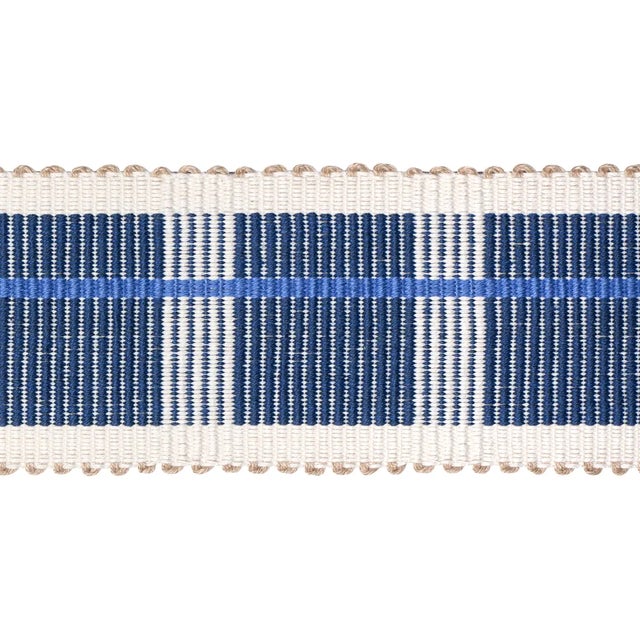 Designed by Stephanie Seal Brown for Schumacher, Calcada Tape pairs a crisp cotton warp with a chunky linen weft in a...