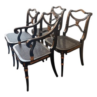Late 20th Century Neoclassical Regency Style Ebonized & Gilt Cane Seat Dining Chairs, Set of 4 (1 Arm, 3 Side) For Sale