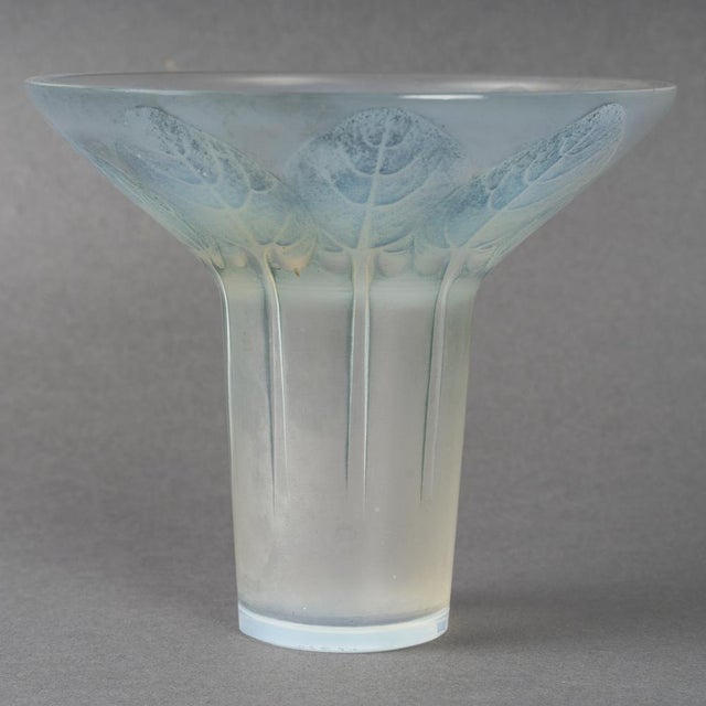 Pressed molded opalescent glass vase Model created in 1921 Félix Marcilhac, catalog raisonné of the glass work of...