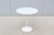 Fabulous 20" round white laminate top side table designed by Eero Saarinen for Knoll. It was introduced in 1956 and...