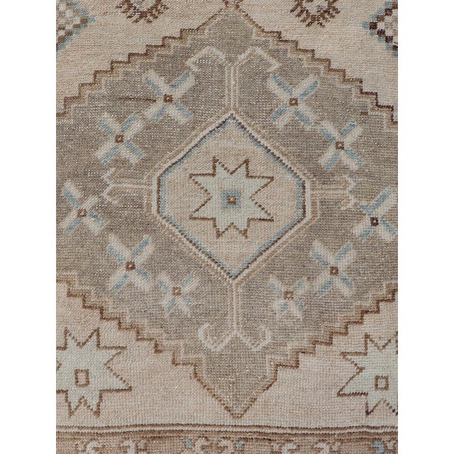 Vintage Turkish Oushak Runner With Soft Earth Tones and Geometric Star Motifs For Sale - Image 4 of 10
