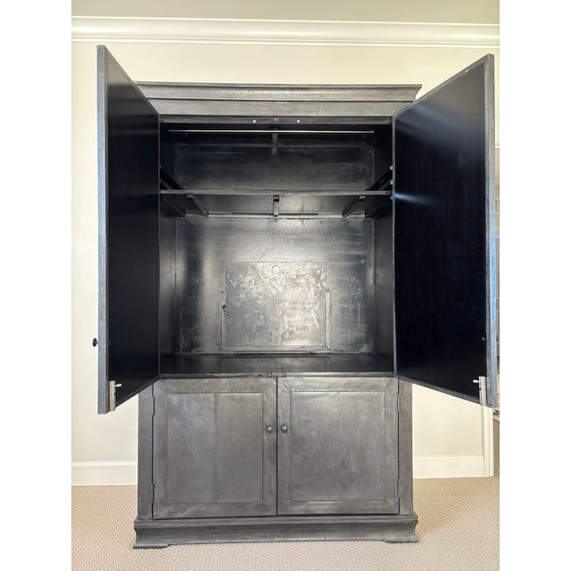 Drawing inspiration from early 20th-century French industrial designs, this authentic Restoration Hardware Annecy armoire...