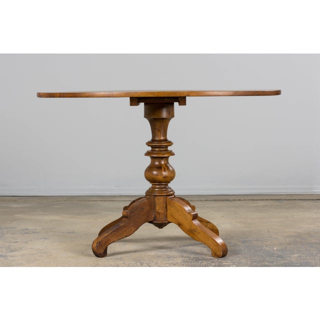 French tilt-top guéridon table crafted in the Louis-Philippe style, sourced in Provence and dating to the early 20th...