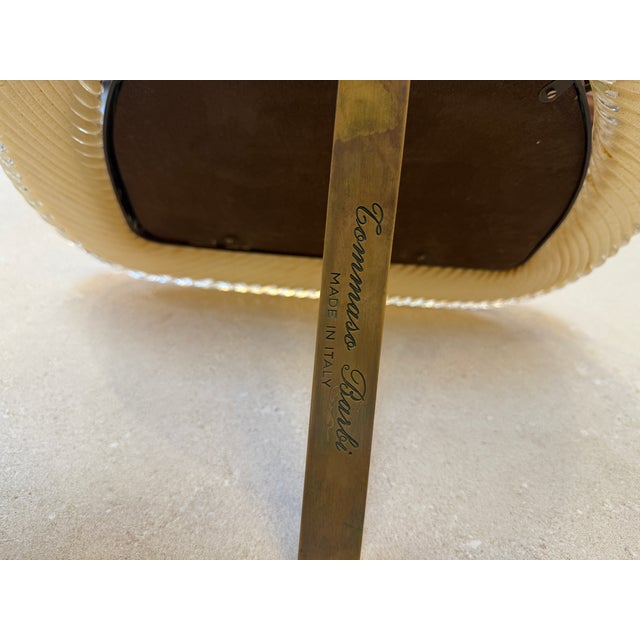 Sculptural Italian photo frame designed by Tommaso Barbi and produced in Italy during the 1970s. The frame features a...