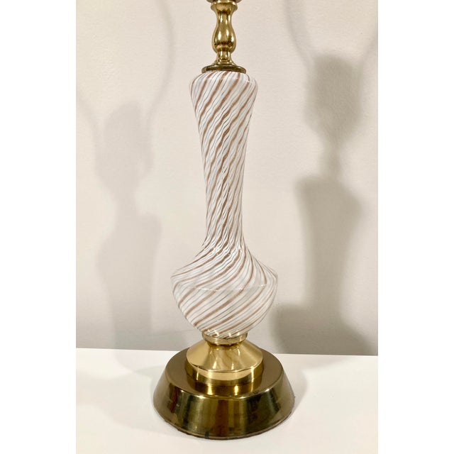 An absolute charmer of a vintage lamp with hand-blown, Italian glass featuring spirals of petite ribbons in white and...