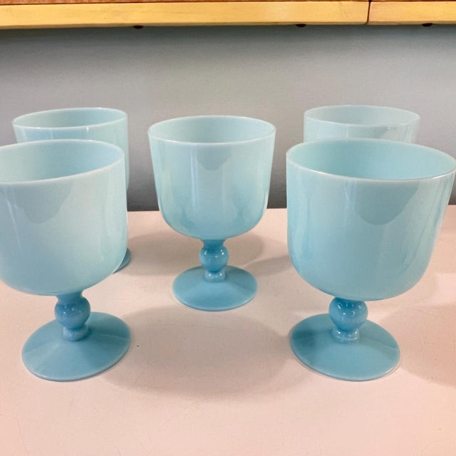 This is a beautiful set 5 of blue opaline water/ wine glasses in mint condition, with no chips or cracks. This lovely blue...