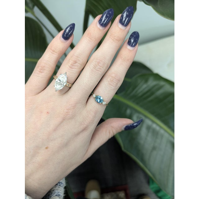 1.6cts blue zircon ring with sparkling natural diamond accents set in solid 14 K gold — timeless elegance with vibrant...