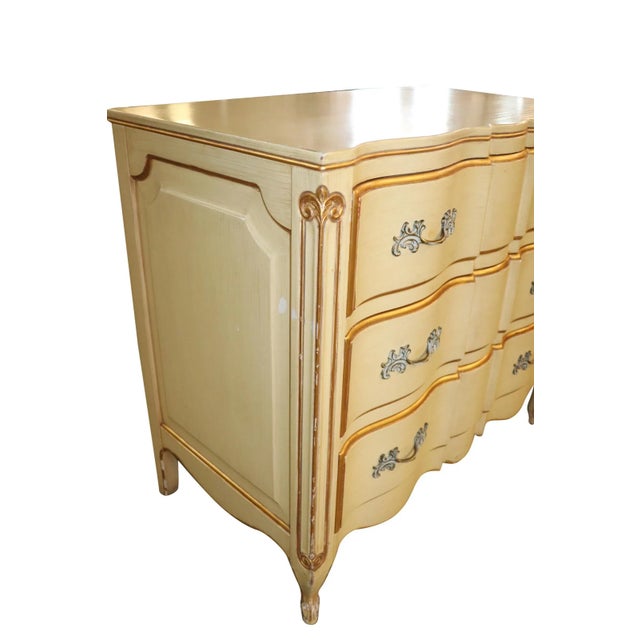 Lovely Cream-colored Bachelors Chest with gold trim. Very elegant & a super quality piece of furniture. Makers Mark by Dixon
