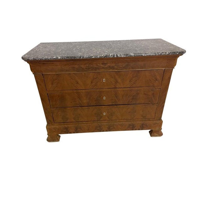Imported from France, this 19th-century burled walnut marble top Louis Phillipe commode. The entire case is made up of...