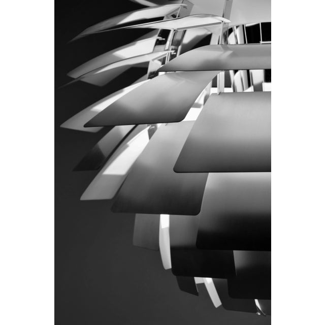 Elevate your space with the epitome of timeless elegance and iconic design – the ph artichoke pendant, a masterpiece...