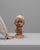 This 1920s French plaster bust of a boy captures the quiet sensitivity and naturalism characteristic of early 20th-century...