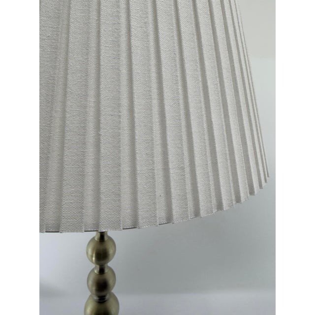 2020s A Pair of Ralph Lauren Antique Brass Buffet Lamps With Pleated Linen Shades For Sale - Image 5 of 5