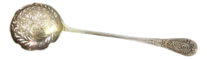 Silver Dusting Spoon with Scalloped Edges and Raised Handle