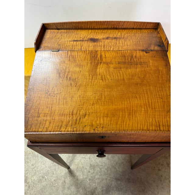 Teachers desk slant top circa 1860. Reproduction stand with drawer.