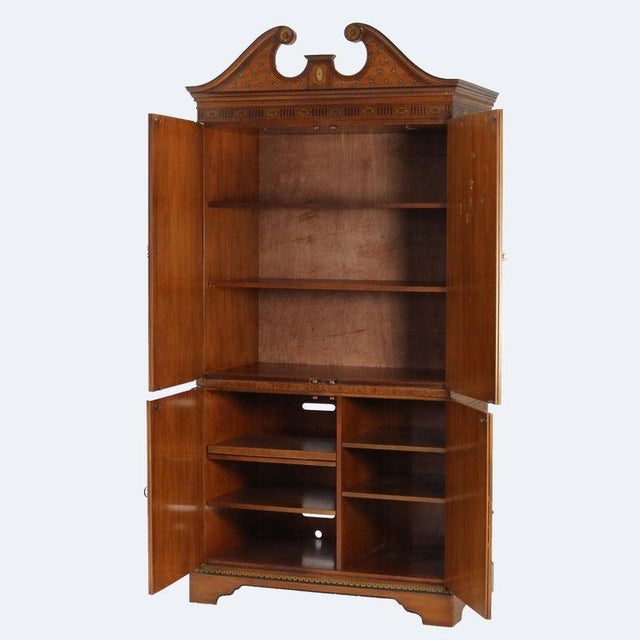Vintage Drexel Heritage English Adam’s Style Neoclassical Armoire 20thC Measures- 88.25"H x 43.25"W x 24.75"D A striking...