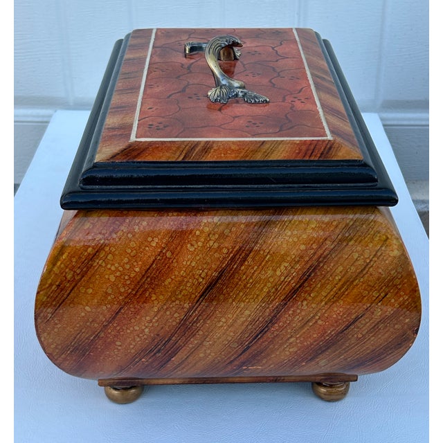 Vintage 1990's Lidded Box has a Transitional Style with a Bombay Shape. Made of Wood & Composite with a Painted Finish....