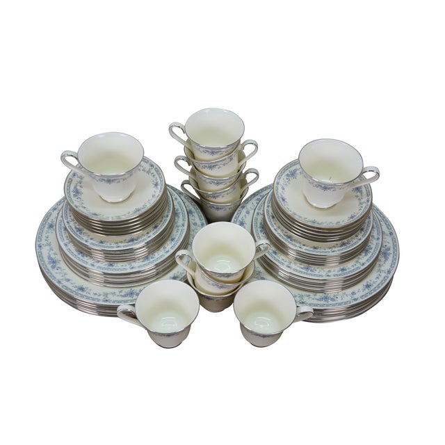60 piece Minton Bellemeade dinnerware set with service for 12. White bone china with silver gilt edge, decorated with a...