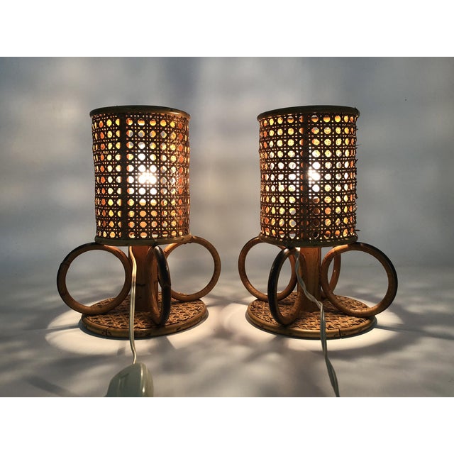 Pair of bamboo, rattan, and cane lamps. Italy, 1950s-60s A beautiful pair of rattan, bamboo, and cane lamps, crafted by...