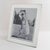 This stunning French mirrored glass picture frame has exquisite silver mirror-beveled edges with a deep geometric design....