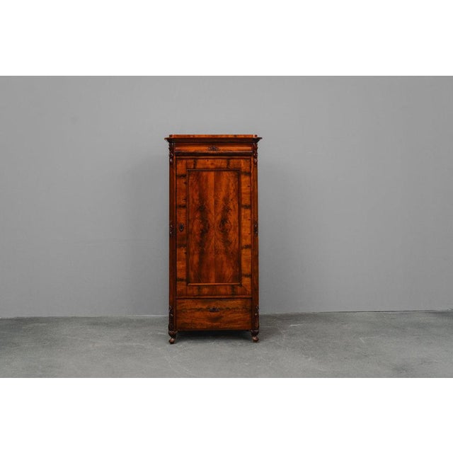 Item: Vertiko Period & Style: Louis Philippe - Mid-19th Century Features: - Elegant and practical piece of furniture with...
