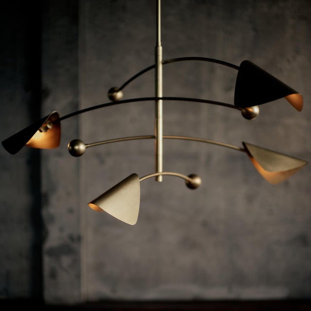 Inspired by the artful balance of Alexander Calder’s mobiles, this chandelier reimagines movement and form in lighting...