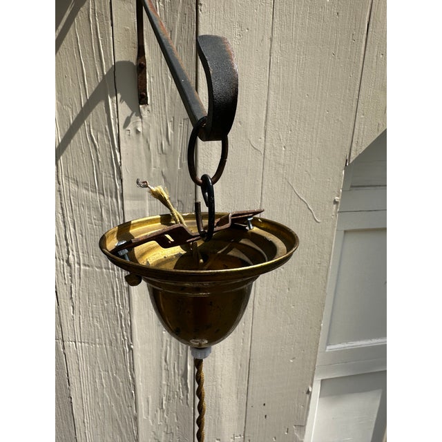Old Lights On is pleased to offer this vintage knob and tube hanging fixture with braided wire and vintage ruffled shade....