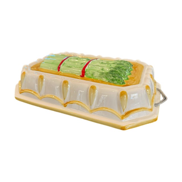 A charming majolica-style ceramic plaque featuring a tied bundle of asparagus in high-relief glaze. Rich in color and...