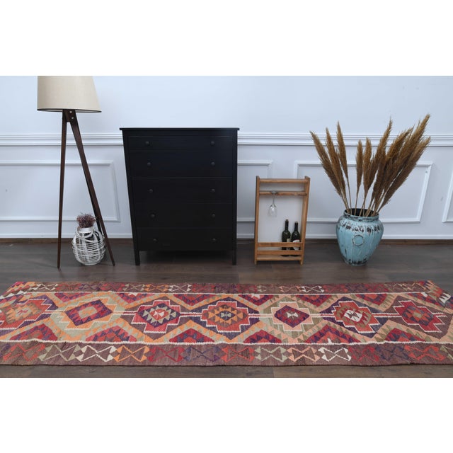 Vintage Persian Hand-Knotted runner rug is a semi-antique vintage runner rug. The '70s Eastern region of Anatolian's...