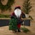 Bring cozy cabin charm to your holiday décor with this Plaid Santa Figurine with Tree and Lantern. Dressed in a classic...