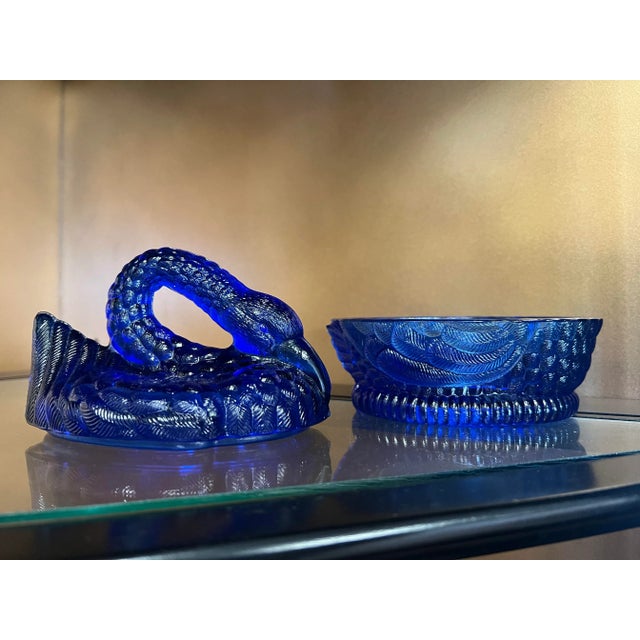 Vintage blue lidded glass dish. Heisey Cobalt Blue Glass Swan Lidded Candy Dish /Jewelry Dish. Measuring about 5 inches...