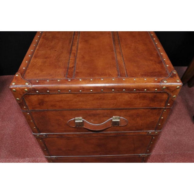 Stunning and large English leather campaign luggage trunk Top opens out to reveal ample storage space inside These look...