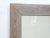 This weathered wood mirror measures 46.5"H x 39.5"W and is set up to hang vertically, but you can change the hangers for...