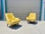 This vibrant pair of mid-century high-back lounge chairs captures the sculptural elegance and architectural stance styled...