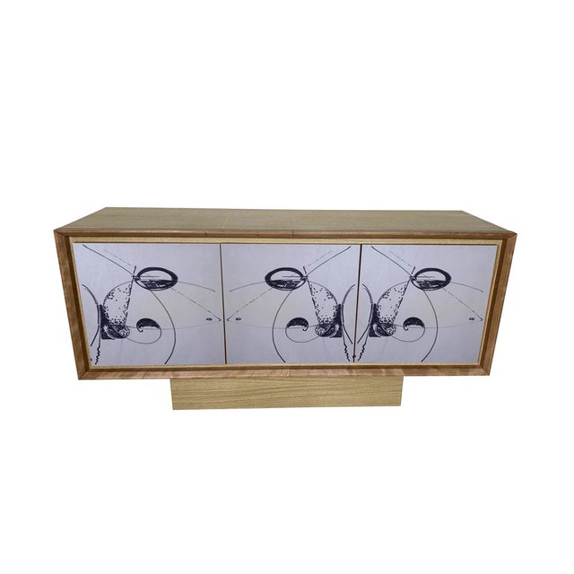 "Artistica Sette" Sideboard 2026 by Meccani Studio for Meccani Design. A beautiful oak sideboard with cherry and walnut...