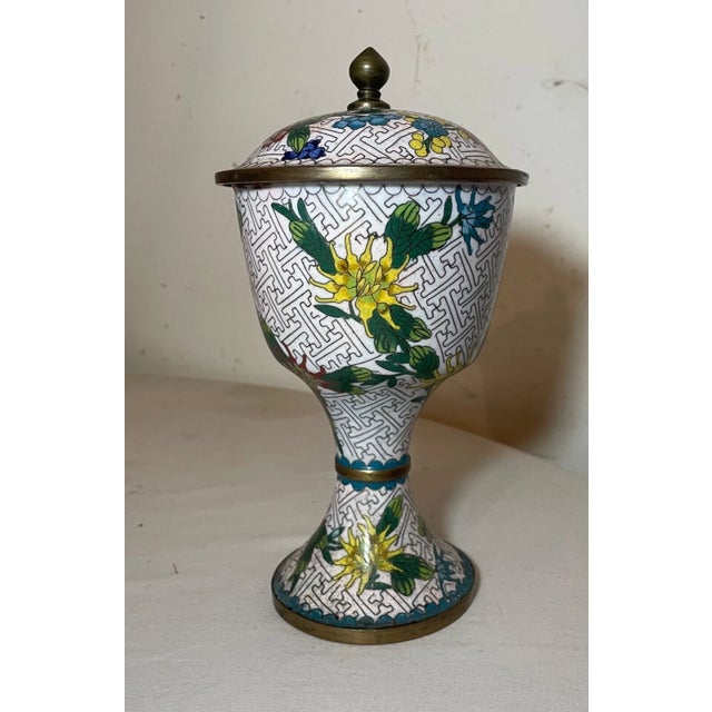 Up for sale is a very nice quality antique handmade Chinese lidded cloisonné urn/jar. It's done with very elaborate hand...