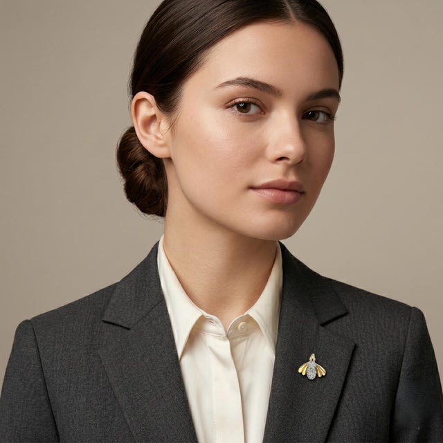 Discover the exquisite charm of our Diamond Bee Brooch/Pin, crafted from luxurious 14k yellow gold and Adorned with 0.6...